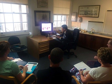 A group of participants taking notes during the Nurse Practitioner Evening